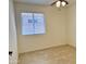 Bedroom with neutral colored walls and a window with horizontal blinds at 4224 E Renee Dr, Phoenix, AZ 85050