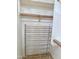 Well organized closet with installed shelving and a rolling rack at 4224 E Renee Dr, Phoenix, AZ 85050
