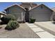 Charming single-story home featuring manicured landscaping, a two-car garage, and a welcoming entrance at 4224 E Renee Dr, Phoenix, AZ 85050
