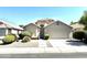 Well-maintained home with desert landscaping, a two-car garage, and a tile roof in a suburban neighborhood at 4224 E Renee Dr, Phoenix, AZ 85050