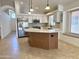Bright, open kitchen featuring a large island with modern appliances and plenty of counter space at 4224 E Renee Dr, Phoenix, AZ 85050