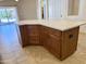 Beautiful kitchen island featuring wood cabinetry, a marble countertop, and ample storage, perfect for entertaining at 4224 E Renee Dr, Phoenix, AZ 85050
