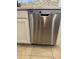 Stainless steel dishwasher integrated into the white cabinetry of the kitchen at 4224 E Renee Dr, Phoenix, AZ 85050