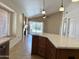 Open-concept living area with tile floors, fireplace, and backyard access through sliding glass doors at 4224 E Renee Dr, Phoenix, AZ 85050