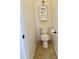 Small powder room with a standard toilet and storage cabinet at 4224 E Renee Dr, Phoenix, AZ 85050