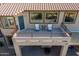 Aerial view of a large balcony featuring outdoor seating, perfect for entertaining guests or enjoying quiet evenings at 4264 S Columbine Way, Gold Canyon, AZ 85118