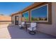 Relax on this charming balcony, furnished with comfortable seating and offering serene mountain views at 4264 S Columbine Way, Gold Canyon, AZ 85118