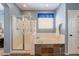 Well-lit bathroom with a walk-in shower and separate soaking tub at 4264 S Columbine Way, Gold Canyon, AZ 85118