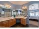 Bright bathroom featuring double sinks, a soaking tub, and separate shower at 4264 S Columbine Way, Gold Canyon, AZ 85118