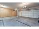 Spacious garage with ample storage cabinetry and bright lighting for a functional workspace at 4264 S Columbine Way, Gold Canyon, AZ 85118