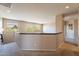 Upstairs loft with large windows providing natural light and views of the surrounding landscape at 4264 S Columbine Way, Gold Canyon, AZ 85118