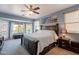 Spacious main bedroom with a large window, bay window, and an art piece at 4264 S Columbine Way, Gold Canyon, AZ 85118