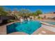 Sparkling pool and spa area surrounded by lush landscaping, perfect for outdoor relaxation at 4264 S Columbine Way, Gold Canyon, AZ 85118