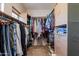 Walk-in closet with ample shelving, hanging space, and natural light at 4264 S Columbine Way, Gold Canyon, AZ 85118