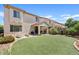 Large backyard with well-maintained lawn and patio area at 4427 W Powell Dr, New River, AZ 85087