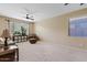 Large living room featuring neutral walls, and a decorative cabinet at 4427 W Powell Dr, New River, AZ 85087