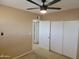 Bedroom featuring neutral walls, carpet and a closet and ceiling fan at 4615 N 39Th Ave # 21, Phoenix, AZ 85019