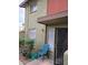 Exterior showcasing a secure gated entry to the property, enhanced by a cozy outdoor sitting area at 4615 N 39Th Ave # 21, Phoenix, AZ 85019