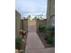 Gate featuring a tall iron gate with plants to the left and right at 4615 N 39Th Ave # 21, Phoenix, AZ 85019