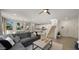 Open concept living room blends seamlessly into the kitchen and staircase creating a warm atmosphere at 4656 E Beck Ln, Phoenix, AZ 85032