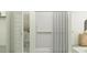Well-lit bathroom with a shower, toilet and a linen closet, featuring a neutral color scheme at 4791 E Shasta Dr, San Tan Valley, AZ 85143