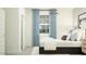 Well-lit bedroom with modern finishes, plush bedding, and contemporary design elements at 4791 E Shasta Dr, San Tan Valley, AZ 85143