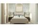 Bright bedroom with decorative accent wall, comfortable bedding, and stylish decor at 4791 E Shasta Dr, San Tan Valley, AZ 85143