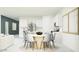 Bright dining area featuring a modern round table with seating for six and contemporary decor at 4791 E Shasta Dr, San Tan Valley, AZ 85143