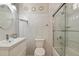 Bathroom featuring a shower/tub combination, white tile walls, and a modern vanity at 481 S San Marcos Dr, Apache Junction, AZ 85120