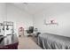 This is a spare bedroom with a ceiling fan and carpet flooring at 6719 W Kerry Ln, Glendale, AZ 85308