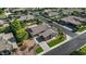 Aerial view of the home showcasing the roof, landscaping, and surrounding community at 6917 E Ingram Cir, Mesa, AZ 85207