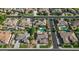 A stunning aerial view of homes in a well-maintained community, each featuring unique architecture and private pools at 6917 E Ingram Cir, Mesa, AZ 85207
