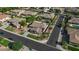 A beautiful home showcases meticulous landscaping, enhancing curb appeal in a serene residential neighborhood at 6917 E Ingram Cir, Mesa, AZ 85207