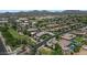 A high-angle aerial shot of a community with views of mountains in the distance at 6917 E Ingram Cir, Mesa, AZ 85207