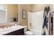 Bathroom features a vanity with a sink, decorative backsplash, a tub, and a shower at 6917 E Ingram Cir, Mesa, AZ 85207