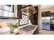 Close up view of a modern kitchen featuring stainless steel appliances, granite counters, and stylish cabinetry at 6917 E Ingram Cir, Mesa, AZ 85207