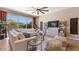 Inviting living room featuring a cozy seating arrangement, contemporary furnishings, and serene outdoor views at 6917 E Ingram Cir, Mesa, AZ 85207