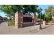Community mailboxes feature stone pillars, brick accents, and manicured landscaping at 6917 E Ingram Cir, Mesa, AZ 85207