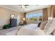 Serene main bedroom featuring soft colors, ample natural light, and relaxing atmosphere at 6917 E Ingram Cir, Mesa, AZ 85207