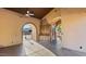 Spacious covered patio features stained concrete floors, ceiling fan, wet bar, and views at 6917 E Ingram Cir, Mesa, AZ 85207