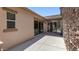 Spacious backyard patio with stone accent wall and plenty of sunlight at 6917 E Ingram Cir, Mesa, AZ 85207
