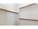 Bright walk-in closet with white walls and adjustable shelving at 6917 E Ingram Cir, Mesa, AZ 85207