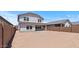 Large, unfinished backyard with a covered patio, perfect for creating your outdoor oasis at 7327 S 76Th Ln, Laveen, AZ 85339