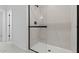 Sleek walk-in shower features a glass enclosure and modern fixtures, creating a spa-like experience at 7327 S 76Th Ln, Laveen, AZ 85339