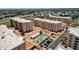 Aerial view showcasing the community's pool, landscaping, and well-maintained buildings at 7920 E Camelback Rd # 104, Scottsdale, AZ 85251