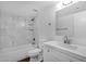 Bathroom features updated shower with marble-look tile, and modern vanity at 7920 E Camelback Rd # 104, Scottsdale, AZ 85251