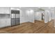 Open kitchen and pantry features stainless steel appliances and ample cabinetry at 7920 E Camelback Rd # 104, Scottsdale, AZ 85251