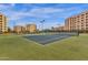 Well-maintained tennis courts surrounded by lush landscaping and a community atmosphere at 7920 E Camelback Rd # 104, Scottsdale, AZ 85251