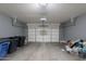 Spacious two car garage with concrete floor and automatic door at 931 S Racine Ln, Gilbert, AZ 85296