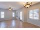 Spacious living room with tile flooring and a patio door provides easy access to outdoor living spaces at 931 S Racine Ln, Gilbert, AZ 85296